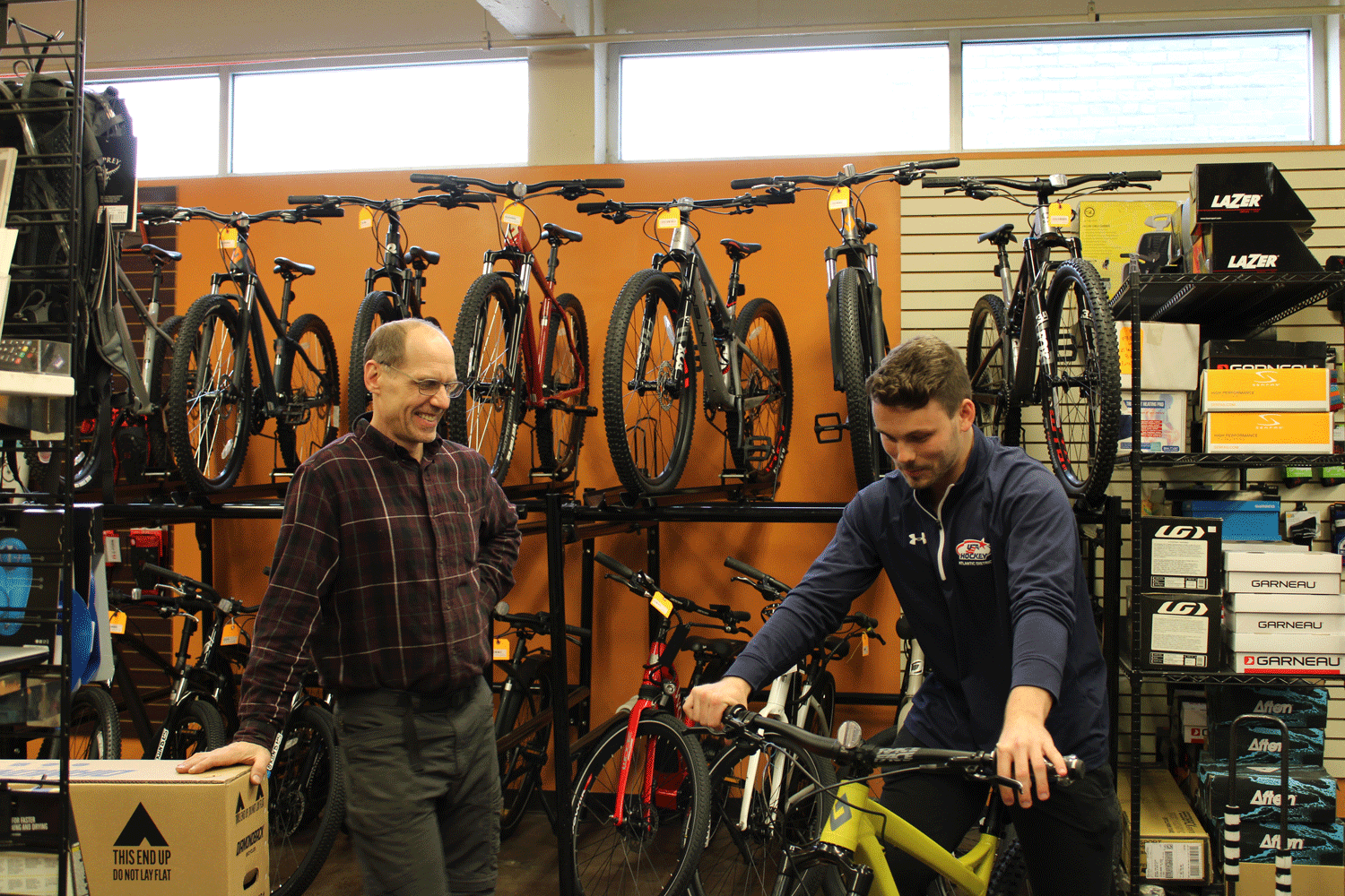 Rich helping a customer at Around Town Bicycles